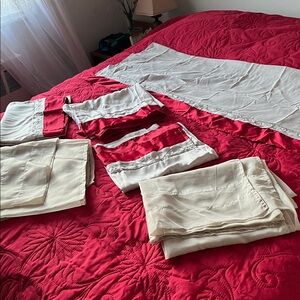 Brand new curtains match the bedding, never used. You can use those straps too.